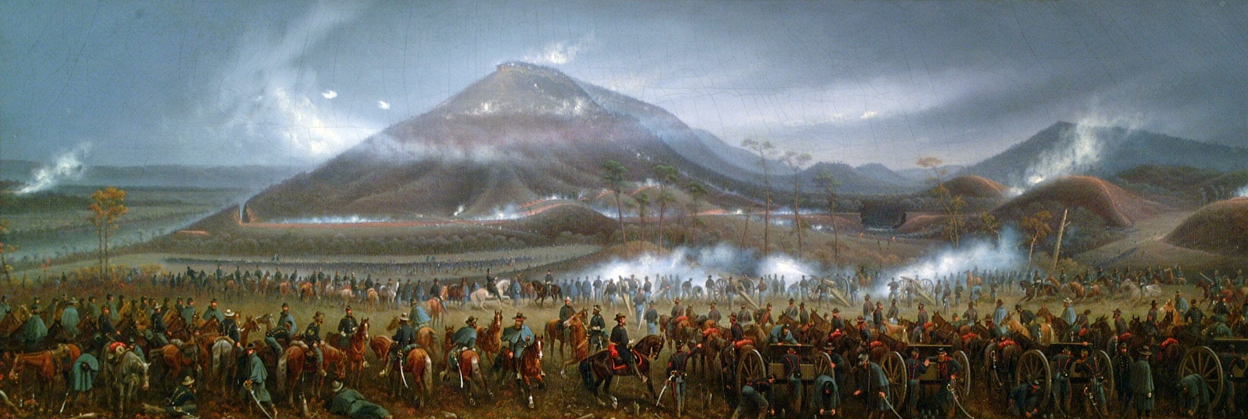 A painting shows a group of people in front of a mountain.