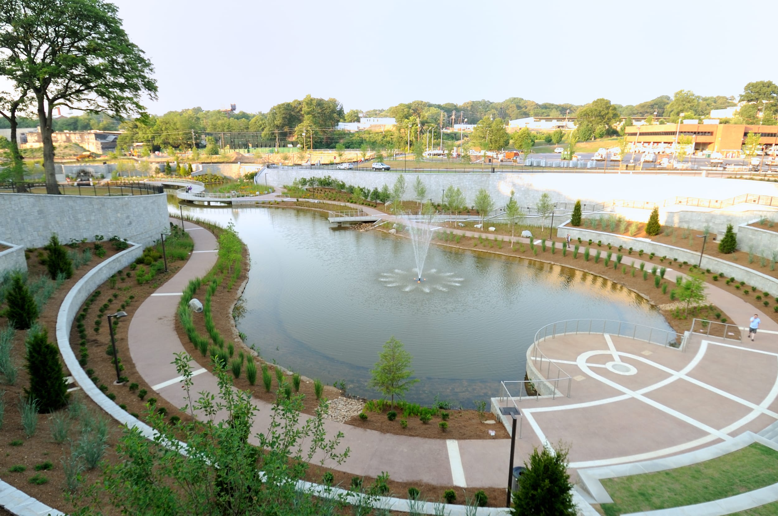 A circular pond in a park.