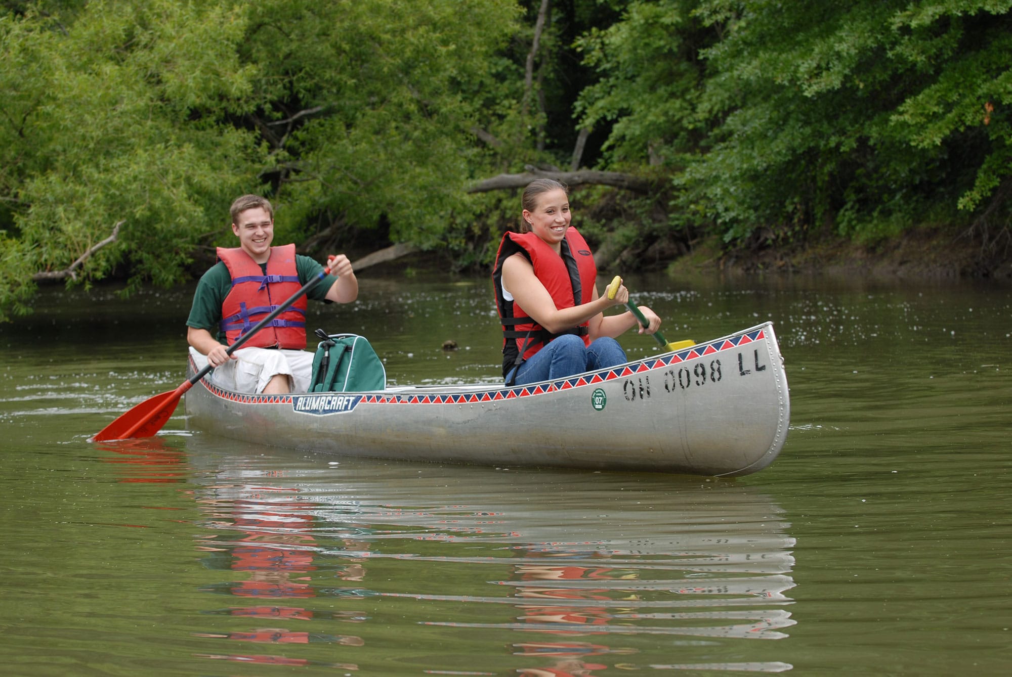 Two people in a canoe.