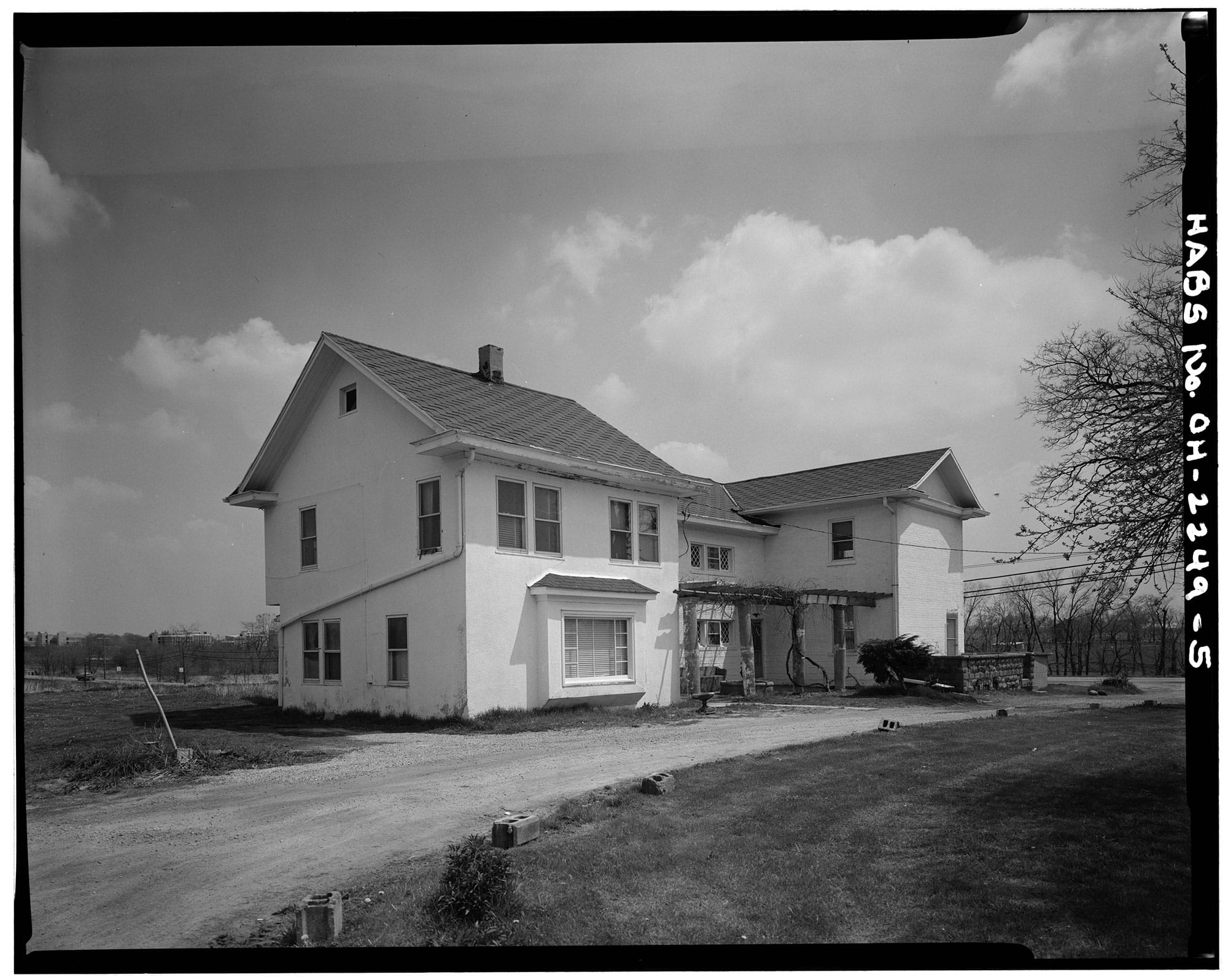 An old black and white photo of a house.
