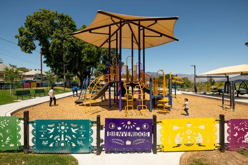 A children's playground with colorful playground equipment.