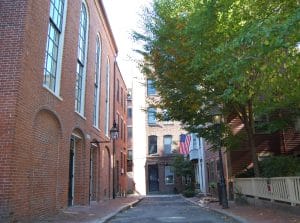 A street lined with brick buildings.