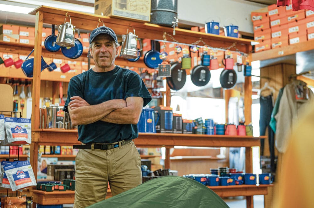 A man standing in a store.