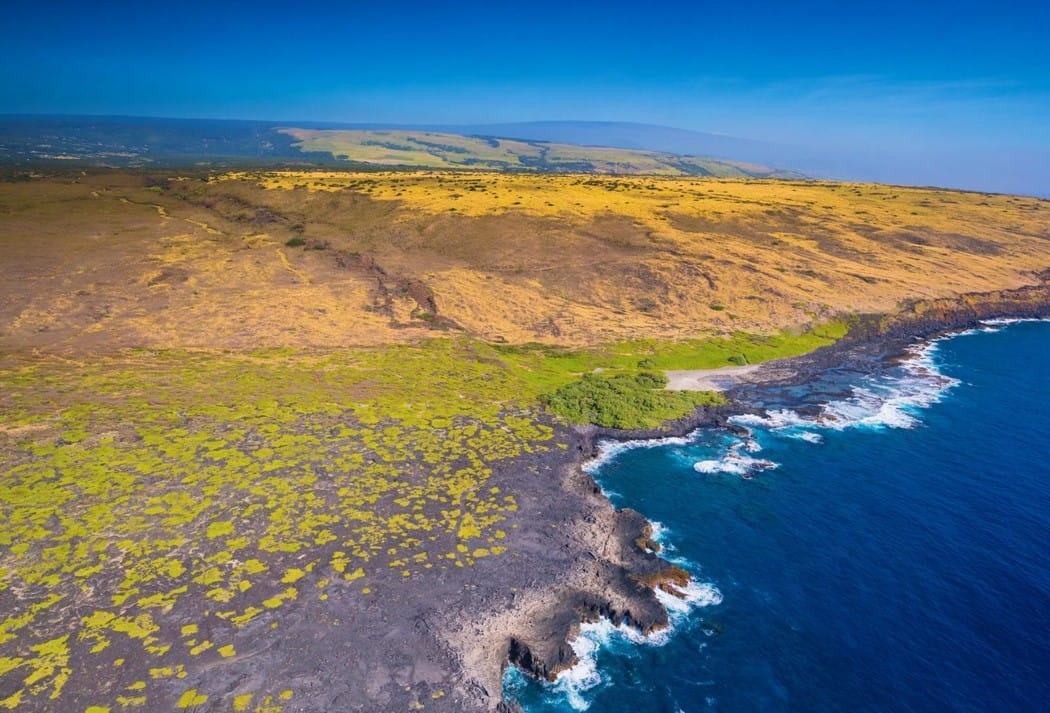 An aerial view of the cliffs and ocean on the island of maui, hawaii.