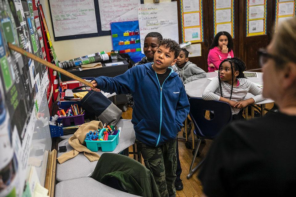 Students are involved in all stages of Community Schoolyards projects, from brainstorming about the design to stewarding the trees and gardens.