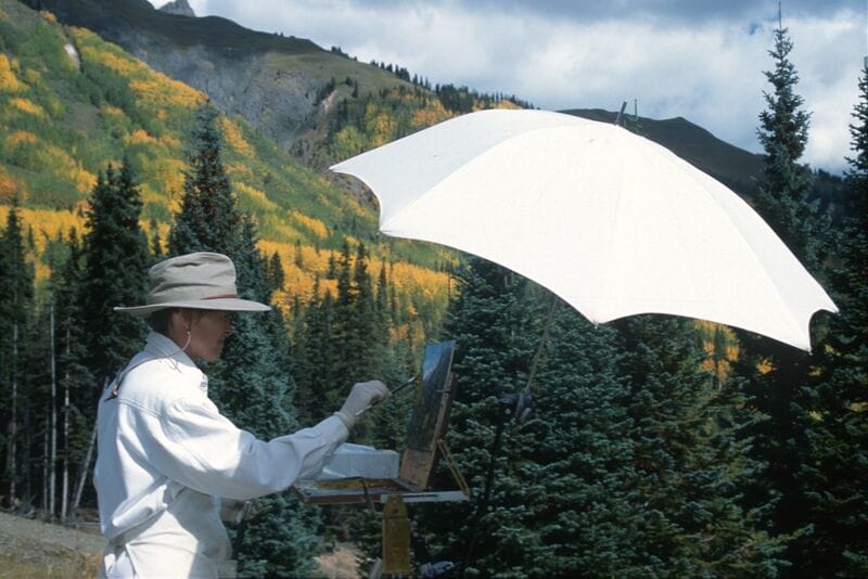 A man holding an umbrella.