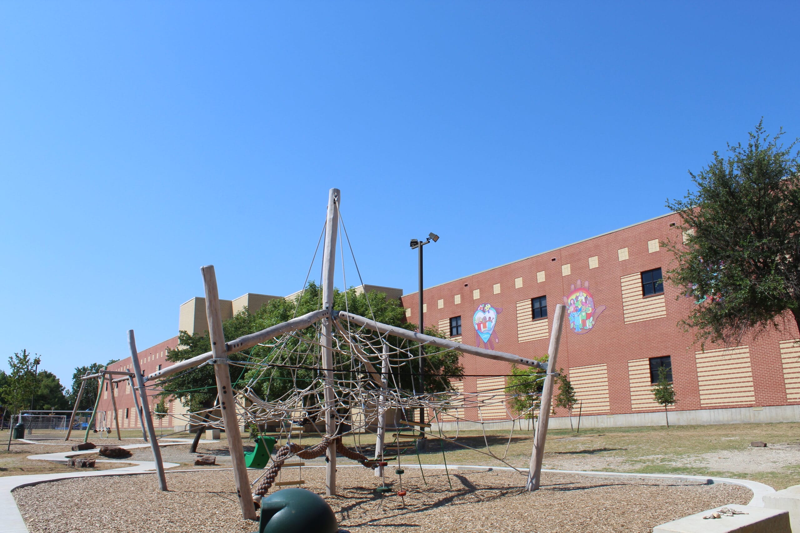A playground with a swing set.