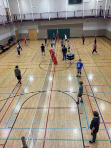 Boys in Saint Paul, Minnesota, compete in volleyball in one of the city’s free sports leagues. Saint Paul used money from the federal American Rescue Plan to waive all fees for at least three years. Photo: Saint PaulParks and Recreation