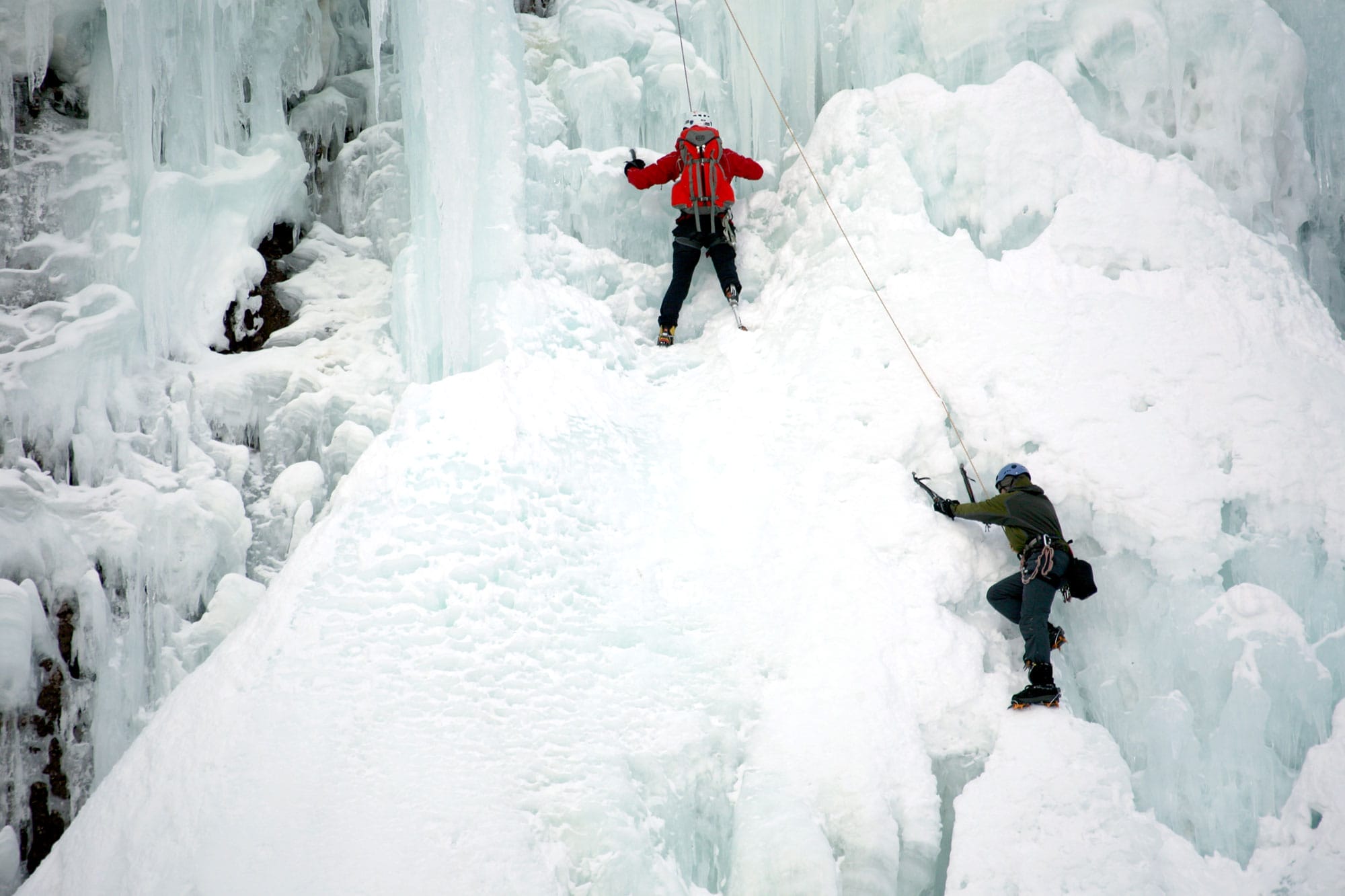 Erik Weihenmayer and Chad Jukes climbing Bridal Veil Falls Ice Wall, on behalf of the Trust for Public Land in Telluride, CO. Kentucky Placer, Telluride Bluegrass Festival.