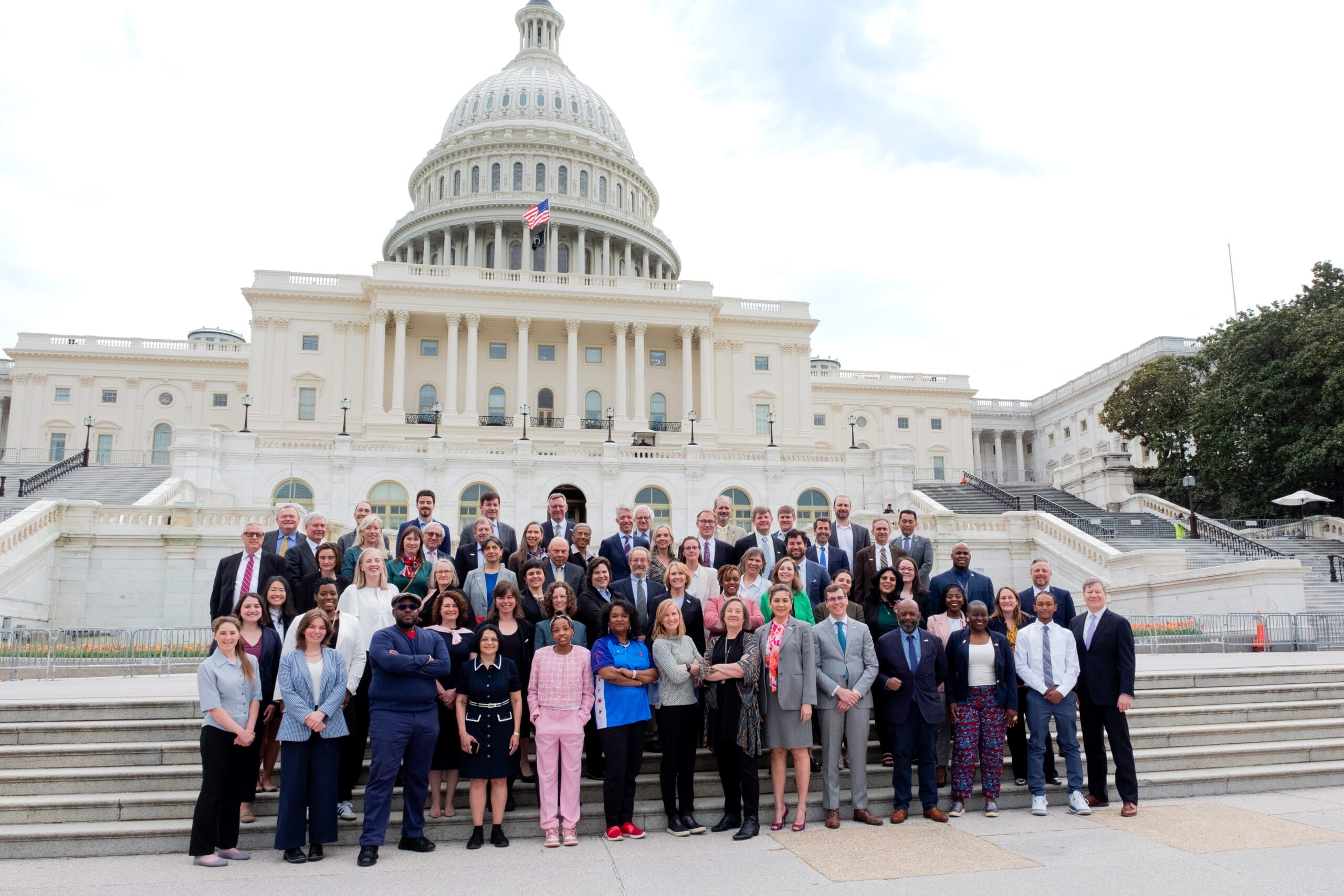 TPL supporters and advocates stand on the steps of of the U.S. Capitol Building.