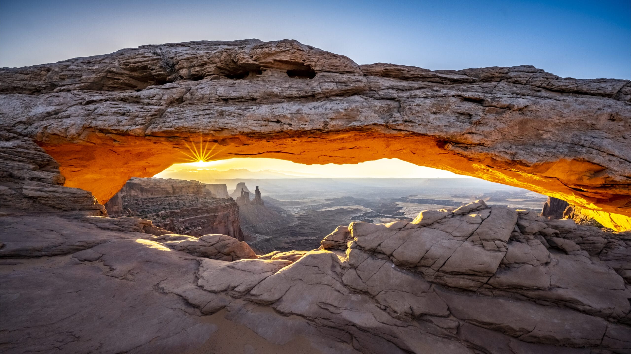 Sunrise at the Mesa Arch in Canyon Lands, UT.